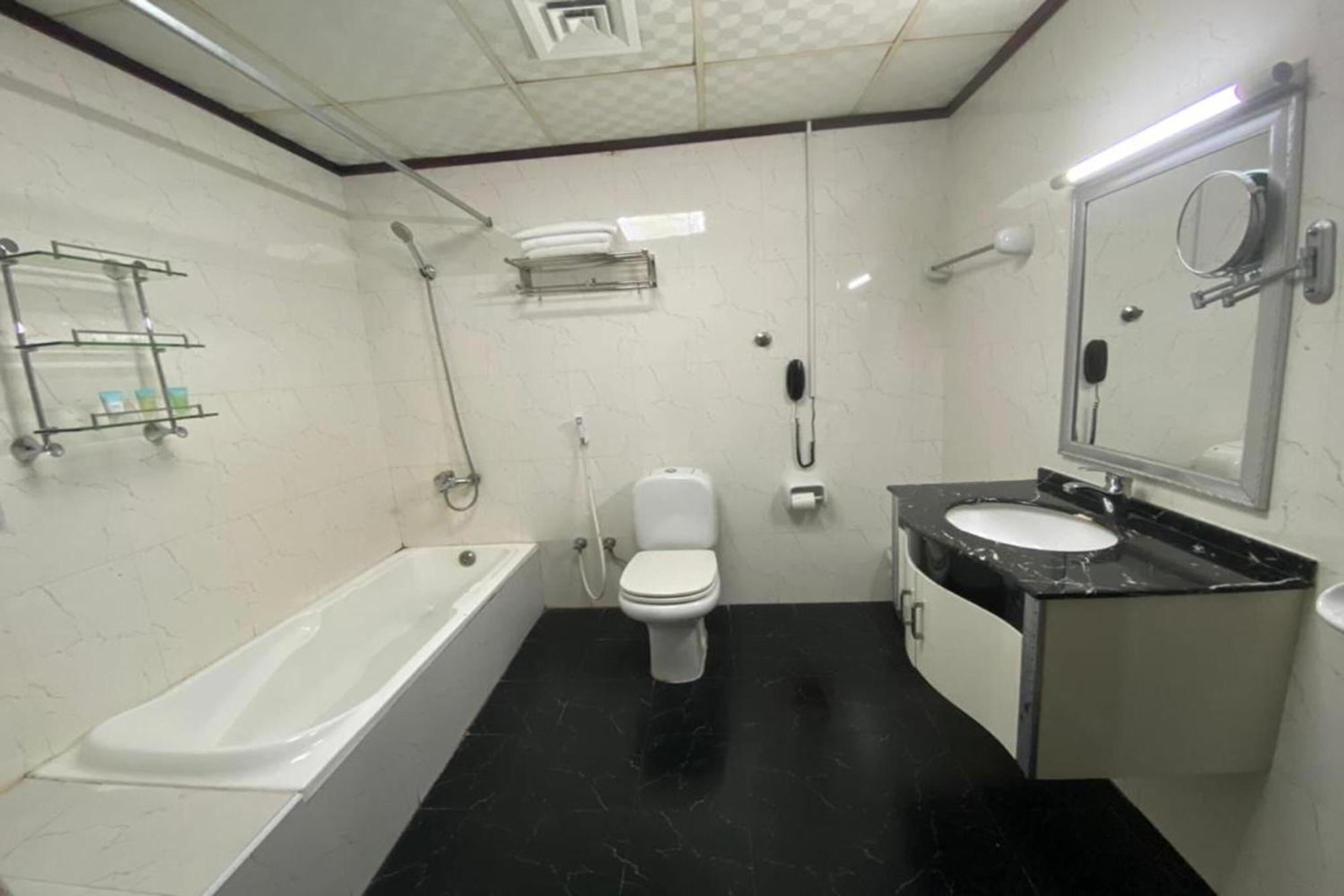 Grand Pj Hotel Ras al-Khaimah Room photo